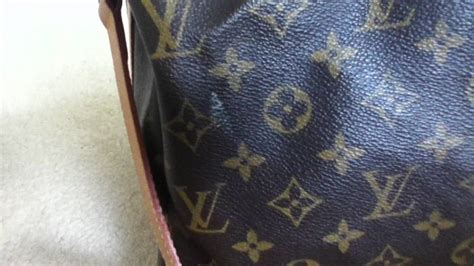 remove white marks from Louis Vuitton